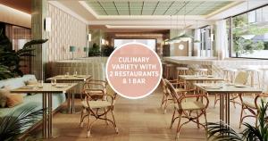 een restaurant met tafels en stoelen en een bord bij Falkensteiner Resort Lake Garda in Salò