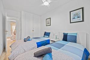 En eller flere senge i et værelse på Beautiful House in a quiet area + 37 billeder