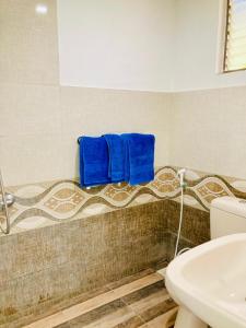 Koupelna v ubytování New Verona Hotel