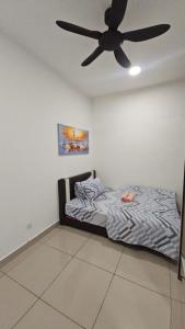 En eller flere senge i et værelse på Bayu Temiang Residence - Be Cityscape Haven