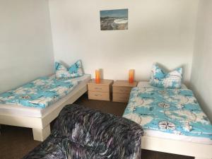 Giường trong phòng chung tại Pension und Arbeiterunterkünfte Michael +2 ảnh