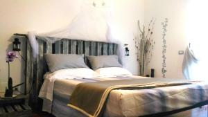 Ένα ή περισσότερα κρεβάτια σε δωμάτιο στο Vistazzurra B&B +38 φωτογραφίες