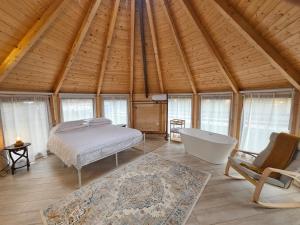 En eller flere senge i et værelse på Oasi del Sangro