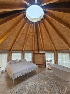 En eller flere senge i et værelse på Oasi del Sangro