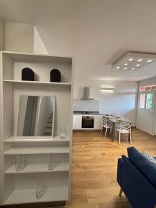 a living room and kitchen with a dining room at Mugello Circuit & Florence charm in Scarperia