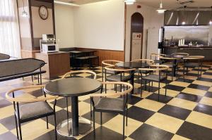 Restaurace v ubytování 寝屋川トレンドホテル + 4 fotografie