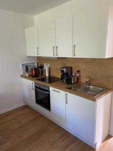 Køkken eller tekøkken på Ferienhaus Wesloer Landstraße 6b