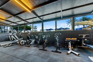 a gym with several exercise bikes in a room at Club Hotel Rama in Beldibi