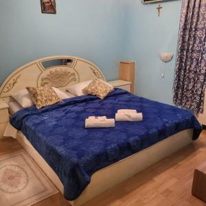 Giường trong phòng chung tại Hotel Matal