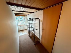 Postel nebo postele na pokoji v ubytování Pension Hraničář