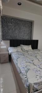 En eller flere senge i et værelse på Vananta luxury homes