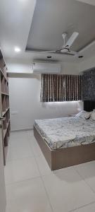 En eller flere senge i et værelse på Vananta luxury homes