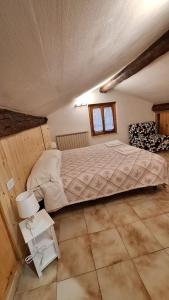 En eller flere senge i et værelse på Agriturismo il Fosso La Casa Piccola