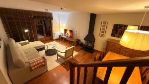 Khu vực ghế ngồi tại Montlude Apartament