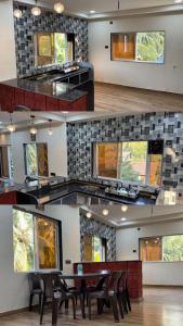 ein Esszimmer mit Tisch und Stühlen und Fenstern in der Unterkunft Shubharambha Luxury Resort in Nagaon