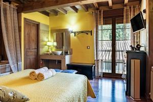 Giường trong phòng chung tại Casa Quimera