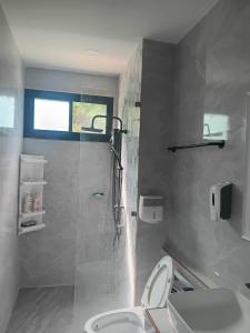 Phòng tắm tại Backpack Bay