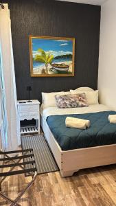 En eller flere senge i et værelse på La Casa del Caribe