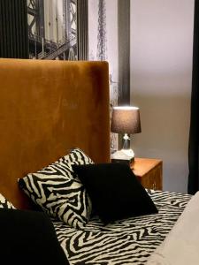 Postel nebo postele na pokoji v ubytování Asnb Residence F1 - 1BHK