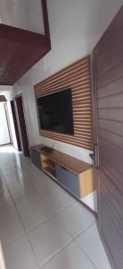 TV/trung tâm giải trí tại Flat no bosque da praia Pipa-RN