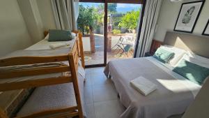 En eller flere senge i et værelse på Villa Antonino