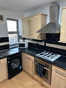 Køkken eller tekøkken på Stunning Apartments Central Croydon