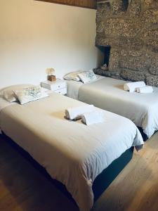 Postel nebo postele na pokoji v ubytování Retiro de Várzeas . Casa de Turismo Rural