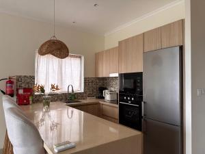 Nhà bếp/bếp nhỏ tại Cocoon