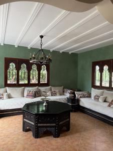 En eller flere senge i et værelse på Agadir-Taghazout Magnifique Villa Dar Lina 4 etoiles