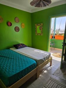 Postel nebo postele na pokoji v ubytování Charming 2-Bedroom Apartment in the Heart of Sousse