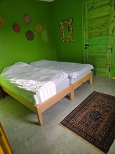 Postel nebo postele na pokoji v ubytování Charming 2-Bedroom Apartment in the Heart of Sousse