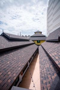 a view of the roofs of a building at De Thaphae Chiangmai in Chiang Mai