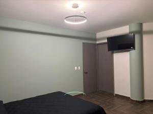 Et tv og/eller underholdning på Hotel Azomali plus