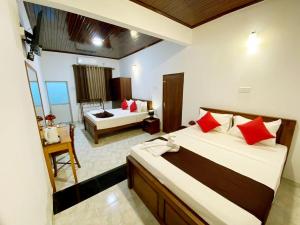 En eller flere senge i et værelse på Villa Black Boulder