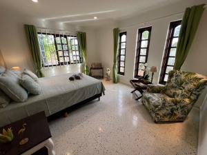 Postel nebo postele na pokoji v ubytování Kas Emmali Curacao