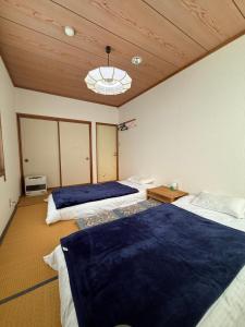 En eller flere senge i et værelse på 雪之宿