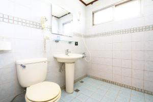 Koupelna v ubytování Jheng Tong House