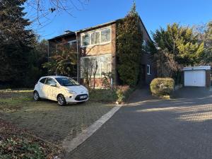 En have udenfor Gemütliches Zimmer mit großem Bad