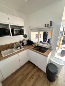 Kuchyň nebo kuchyňský kout v ubytování Appartement Pornic plage Noëveillard à pied + 8 fotografií