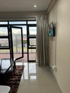 Et tv og/eller underholdning på Ollet Heights - Ocean View