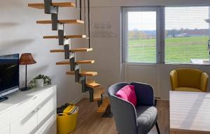 Et tv og/eller underholdning på Nice Apartment In Allinge