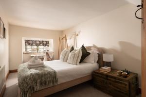 En eller flere senge i et værelse på Coniston House - Eco Hot Tub