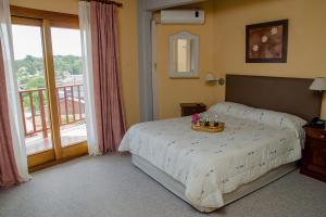 Giường trong phòng chung tại Hosteria Kaiken II