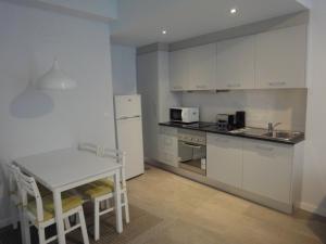 Kuchyň nebo kuchyňský kout v ubytování QUO Almeida Garrett + 7 fotografií