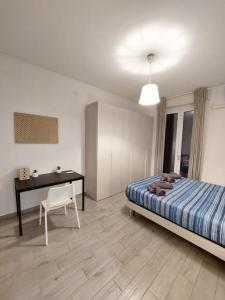 En eller flere senge i et værelse på Exclusive house - tra Malpensa MXP e Milano - Legnano