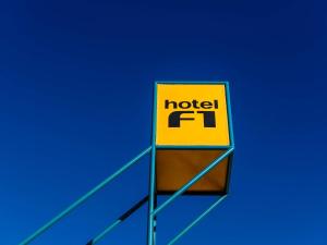 a sign for a motel f installed on top of a building at HOTELF1 Le Havre Est - Gonfreville in Gonfreville-lʼOrcher