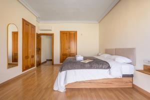 Postel nebo postele na pokoji v ubytování Sueños De La Vega + 25 fotografií