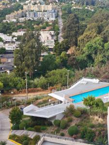 Swimmingpoolen hos eller tæt på Departamento Reñaca Bajo