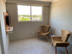 Et tv og/eller underholdning på Residencial T&D V