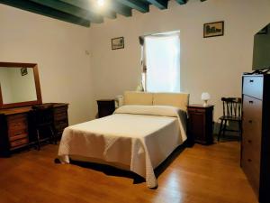 Postel nebo postele na pokoji v ubytování Villa Trigatti